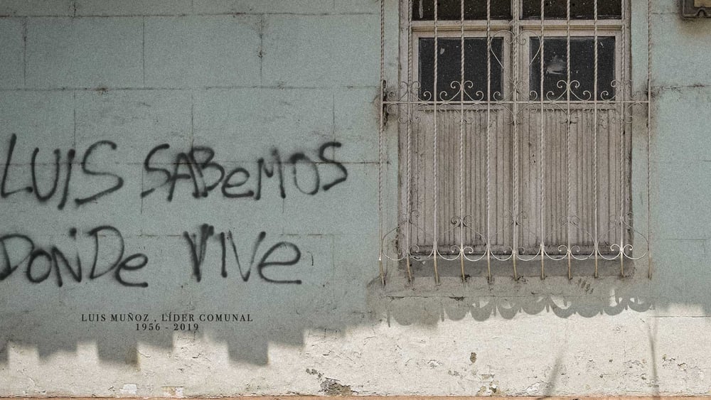 Keine leere Drohung:  Der im Graffito mit dem Tod bedrohte Menschenrechtsverteidiger wurde später umgebracht. © Amnesty International.