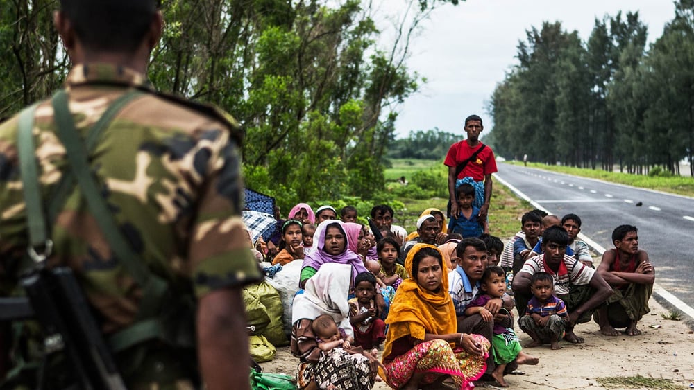 Rohingya-Flüchtlinge an einem Strassenrand in Bangladesh, 28. September 2017 © Andrew Stanbridge / Amnesty International