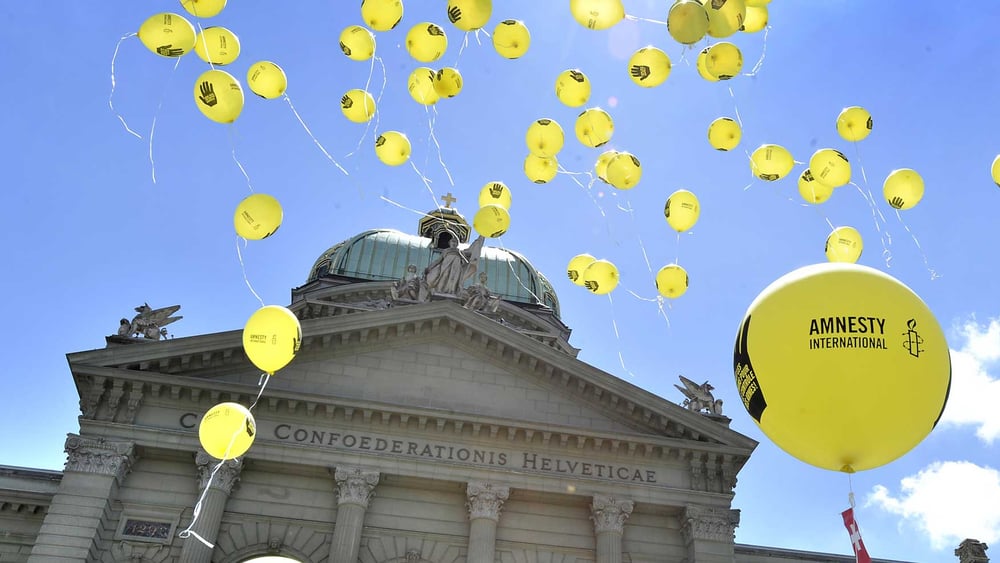 Amnesty-Aktion vor dem Bundeshaus in Bern. © Valérie Chételat