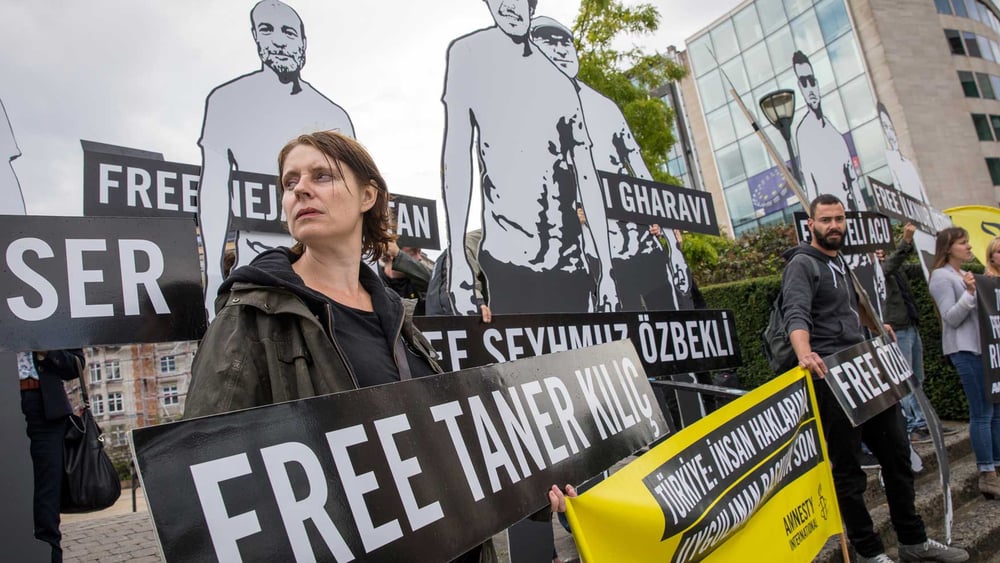 Protest-Aktion vor dem Sitz der Europäischen Kommission in Brüssel © Richard Burton/Amnesty International