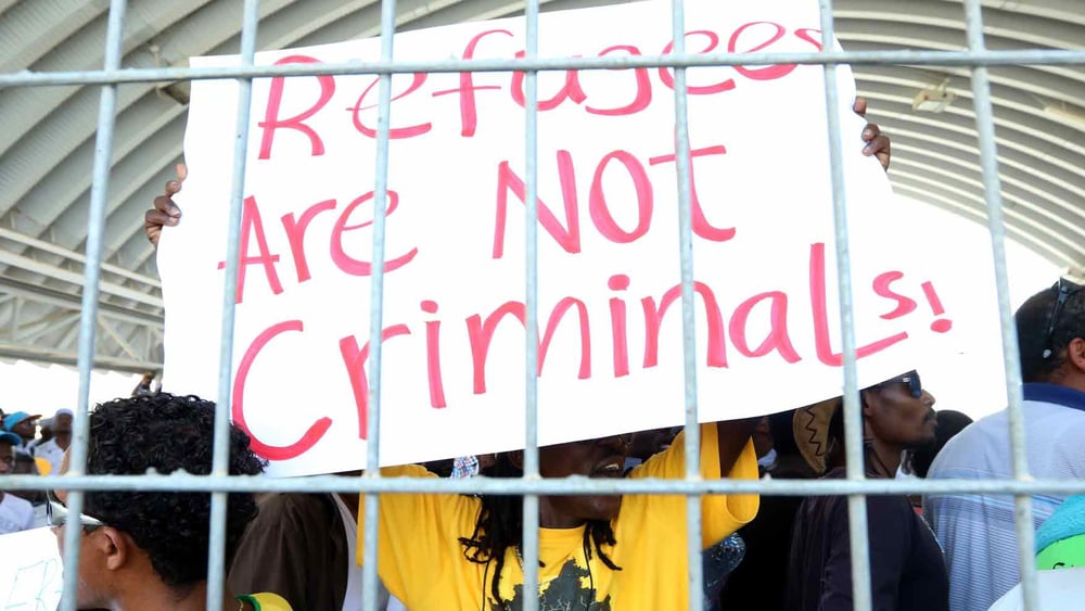 Asylsuchende protestieren im Holot-Zentrum in der Negev-Wüste in Israel am Weltflüchtlingstag, 20 June 2014. © Haim Schwarczenberg