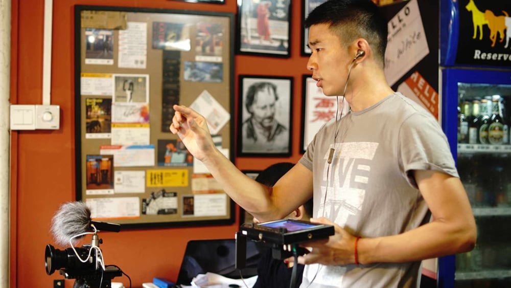 Der Filmemacher Popo Fan bei Dreharbeiten. © Pan Jinxin