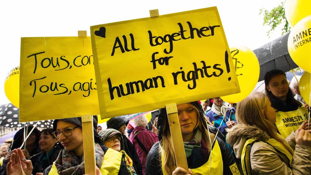 Aktion an der Generalversammlung von Amnesty Schweiz, April 2016. © Klaus Petrus