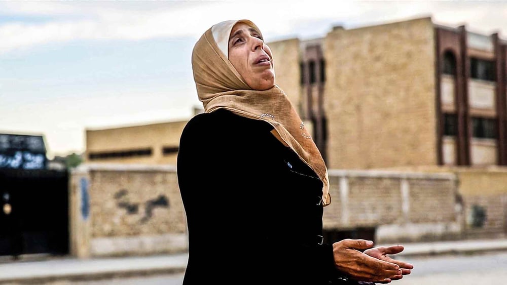 Durant quatre ans, Carsten Stormer a été l'un des rares journalistes à se rendre en Syrie et à en rapporter des comptes rendus de première main. Une femme à Alep, décembre 2013. © Carsten Stormer