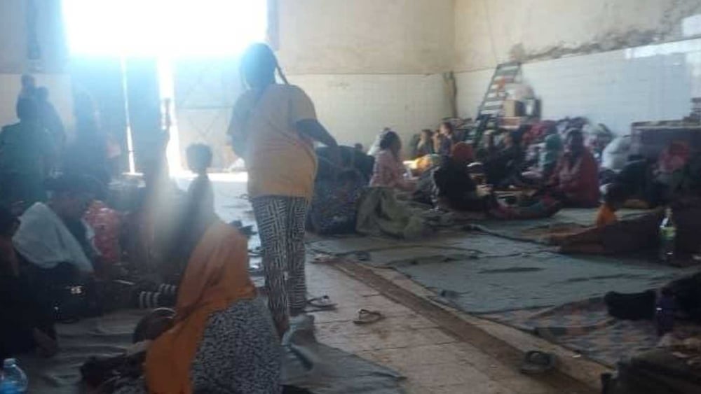 Couverture du rapport: 'Egypt: «Handcuffed like dangerous criminals»: Arbitrary detention and forced returns of Sudanese refugees in Egypt' © Amnesty International