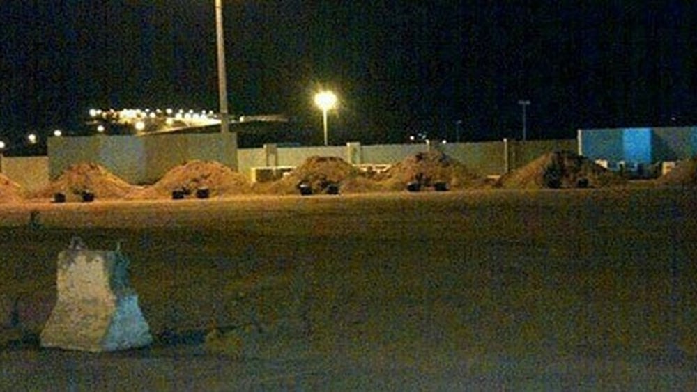 Collines de sable préparées pour les executions.  © Private