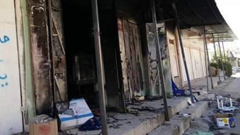 Des chercheurs d'Amnesty International ont photographié des bâtiments incendiés dans le marché de Al-Jumhuriya, dans la ville de Tuz Khurmatu, le 18 octobre 2017. © Amnesty International