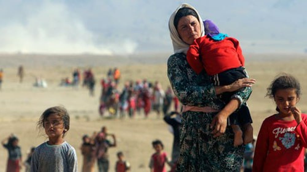 Depuis que l’EI a pris le contrôle de Mossoul, le groupe fait régner la terreur, commettant exécutions, violences sexuelles et torture contre les minorités religieuses et ethniques.  © STRINGER/Reuters/Corbis