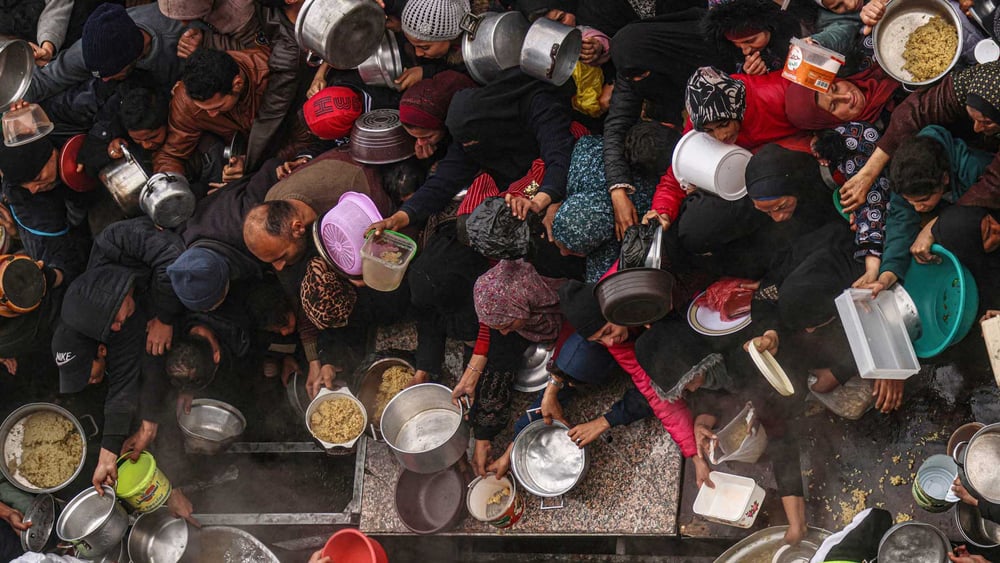 En février 2024, les distributions de rations de nourriture, sous l'égide de l'ONU, ne faisaient pas peser de risques sur les Palestinien·ne·s. © SAID KHATIB/AFP via Getty Images