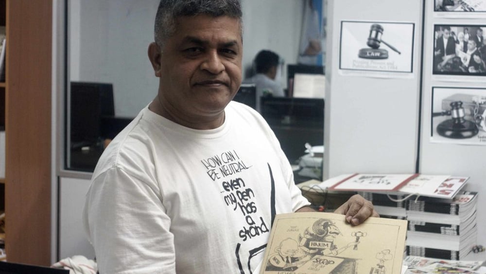 Le caricaturiste Zunar. © Amnesty International