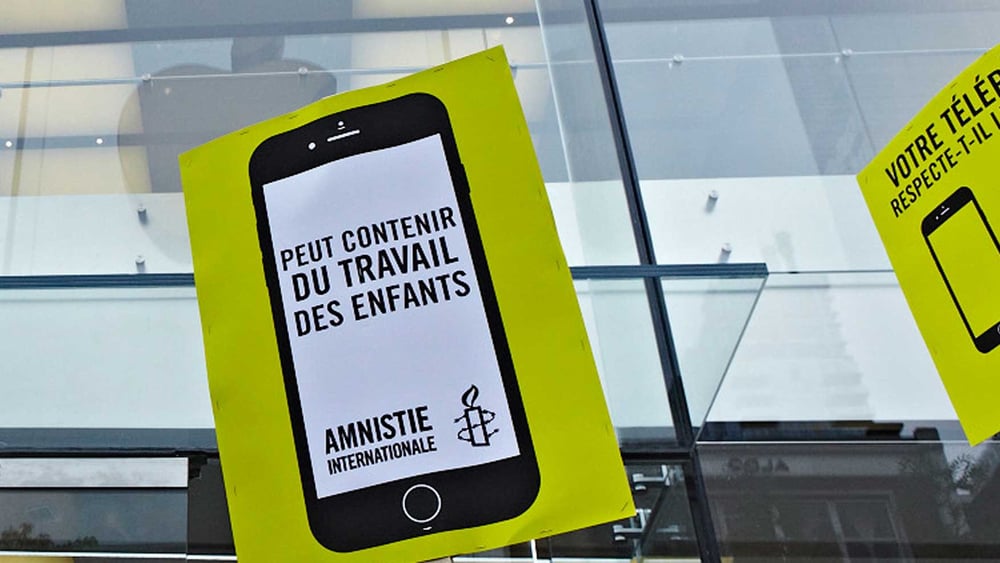 Manifestation d'Amnesty devant le magasin d’Apple à Montréal, juin 2016. © Rodolphe Beaulieu