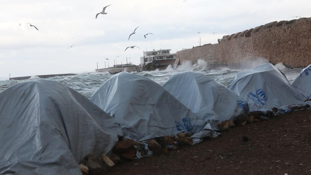 Des réfugiés sur l'île de Chios, en Grèce. © Giorgos Moutafis/Amnesty International