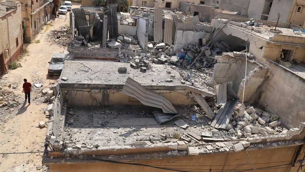 Le case di Qasr Bin Ghashir sono state distrutte da dei raid aerei del Governo di Accordo Nazionale, il 23 giugno 2019. © AI