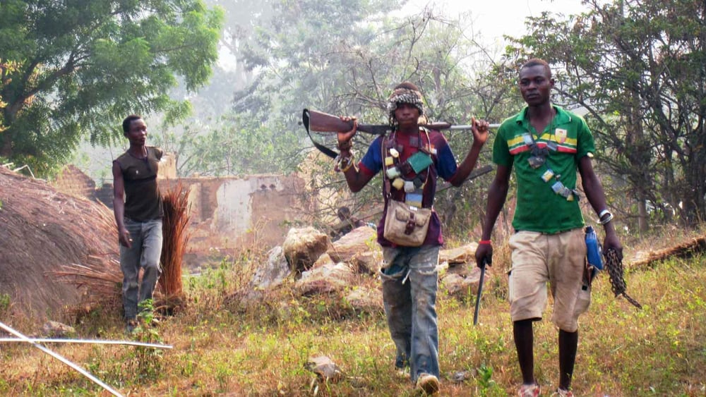 Membri della milizia anti-Balaka coinvolti nelle razzie, incluso il rogo di una moschea, a nord di Bangui, 23 gennaio 2014.