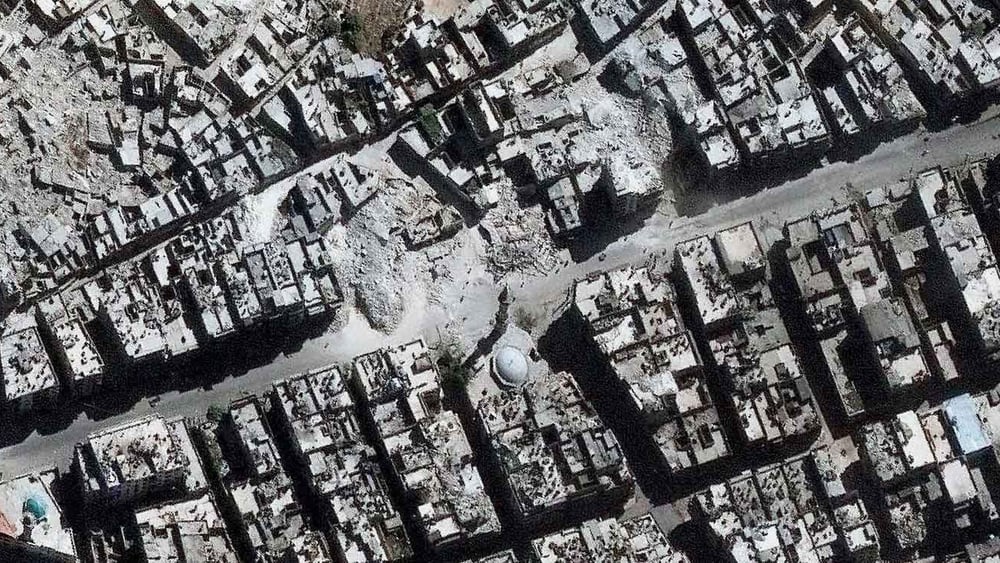 Un’immagine satellitare che mostra l’immensa distruzione di Aleppo © DigitalGlobe 2016 — Cliccare sull’immagine per continuare