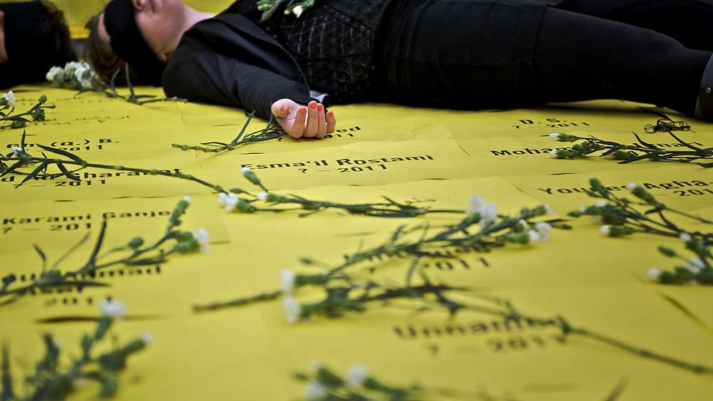 Azione di protesta contro l'esecuzione di minorenni al momento del reato in Iran. © Amnesty International