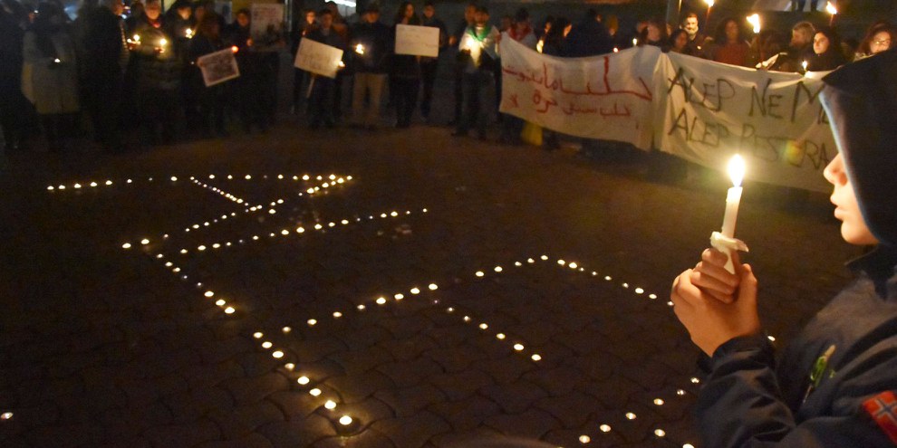 In den Mahnwachen in verschiedenen Schweizer Städten wurde der Opfer in Aleppo gedacht – hier in Lausanne. © Amnesty International