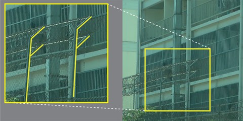Fassade eines der Zentren: der Stacheldraht soll die Flucht verhindern © Amnesty International
