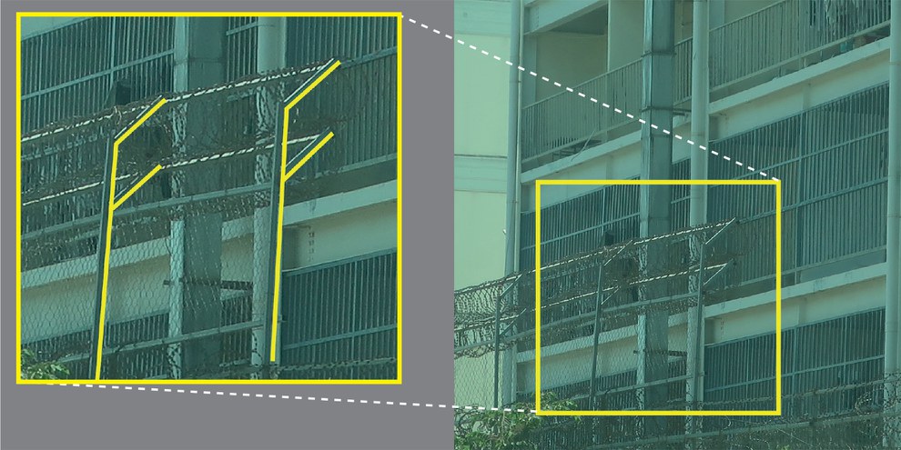 Fassade eines der Zentren: der Stacheldraht soll die Flucht verhindern © Amnesty International