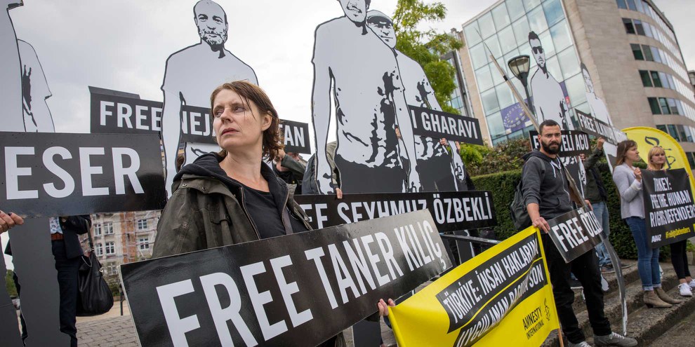 Protest-Aktion vor dem Sitz der Europäischen Kommission in Brüssel © Richard Burton/Amnesty International