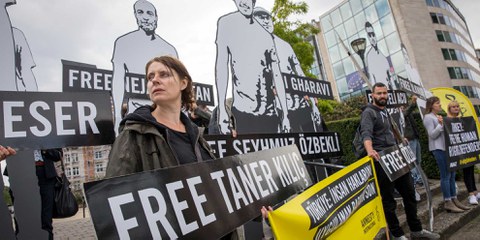 Protest-Aktion vor dem Sitz der Europäischen Kommission in Brüssel © Richard Burton/Amnesty International