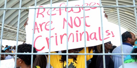 Asylsuchende protestieren im Holot-Zentrum in der Negev-Wüste in Israel am Weltflüchtlingstag, 20 June 2014. © Haim Schwarczenberg