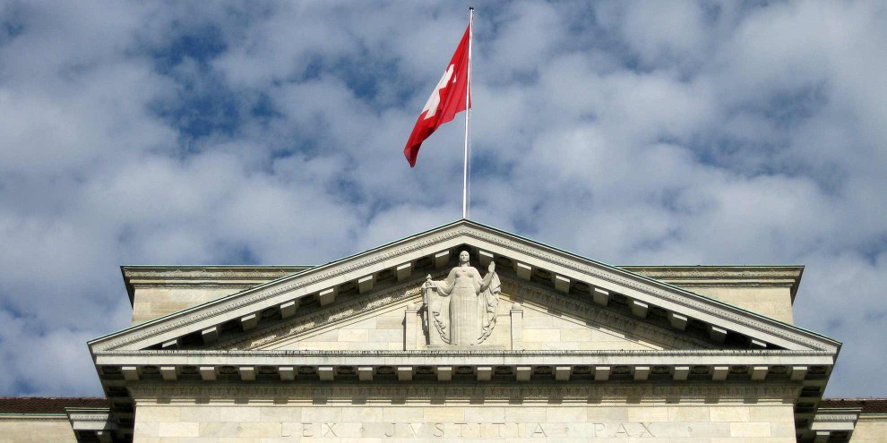 Il existe enfin depuis l’an dernier une «stratégie droits de l’homme» en matière de politique extérieure de la Suisse, mais elle demeure cantonnée au Département fédéral des Affaires étrangères.© Norbert Aepli