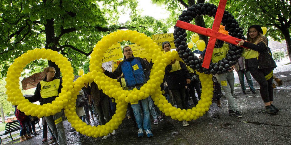 Lancement de la campagne Rio «Cinq anneaux pour Rio. Une flamme pour les droits humains» © Klaus Petrus
