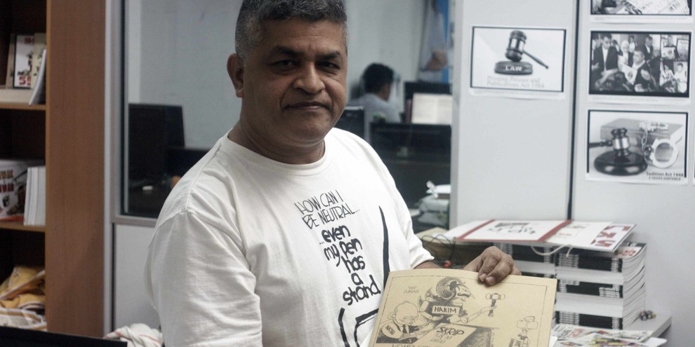 Le caricaturiste Zunar. © Amnesty International