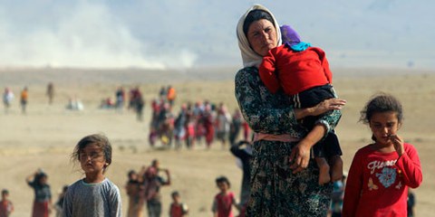 Depuis que l’EI a pris le contrôle de Mossoul, le groupe fait régner la terreur, commettant exécutions, violences sexuelles et torture contre les minorités religieuses et ethniques.  © STRINGER/Reuters/Corbis 