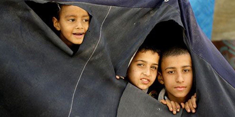 Giovani palestinesi fuggiti dal campo di Yamuk | © AFP/Getty Images