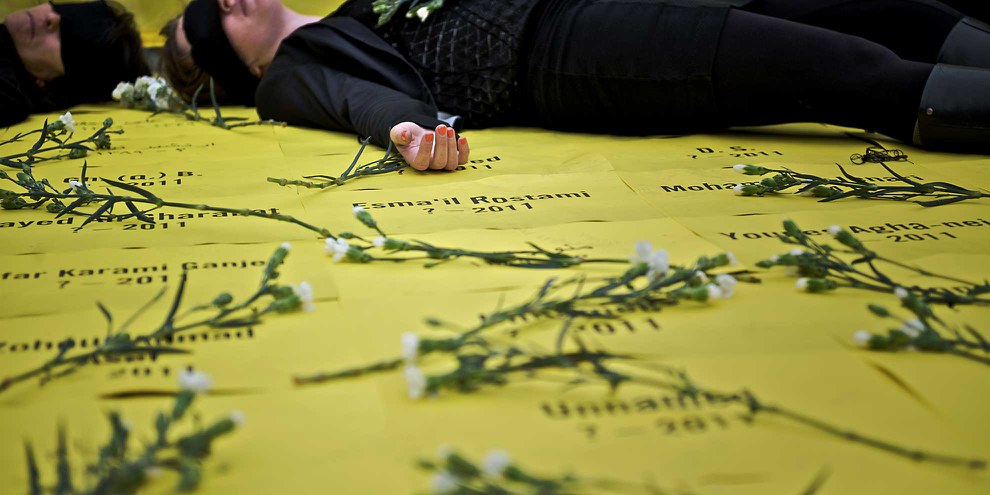 Azione di protesta contro l'esecuzione di minorenni al momento del reato in Iran. © Amnesty International