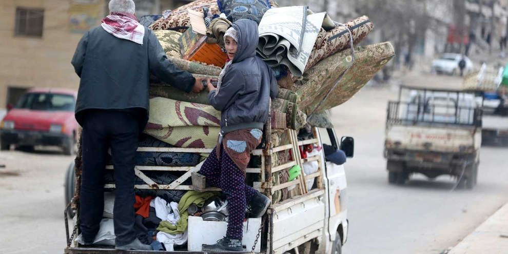 Già un anno fa i civili fuggivano dal nord della Siria in seguito all’operazione turca “ramoscello d’ulivo”, come qui ad Afrin. © KEYSTONE Source EPA Byline AREF TAMMAWI