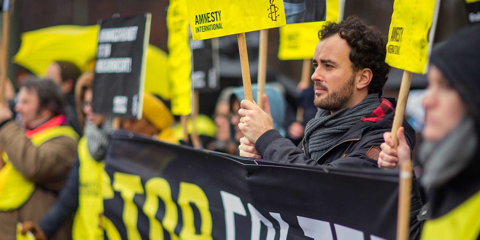 Azione contro la flagellazione di Raif Badawi. © Amnesty International / Hannibal Hanschke
